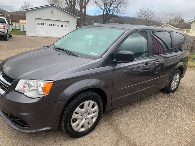 2016 Dodge Grand Caravan for sale at MYERS PRE OWNED AUTOS & POWERSPORTS in Paden City WV