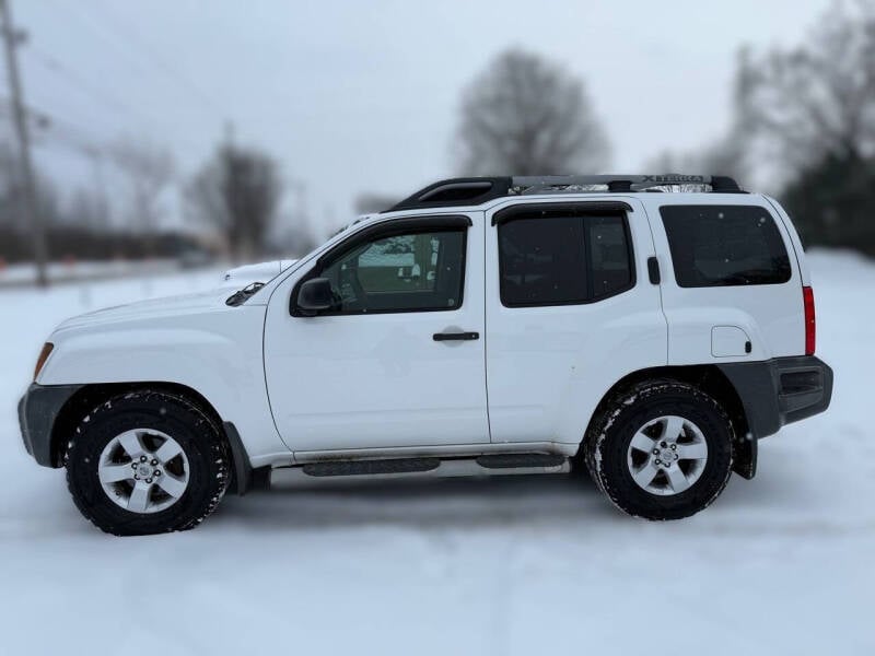 2010 Nissan Xterra for sale at Woolley Auto Group LLC in Poland OH