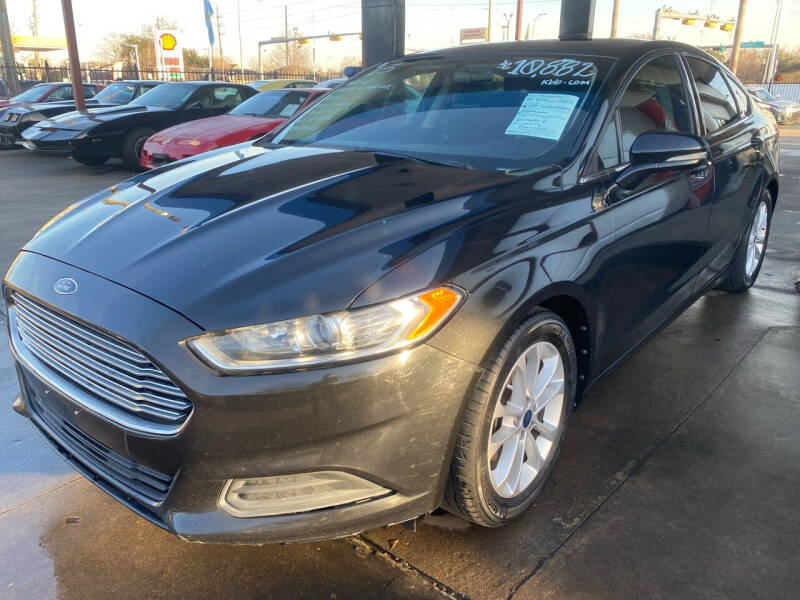 2013 Ford Fusion for sale at Buy-Fast Autos in Houston TX