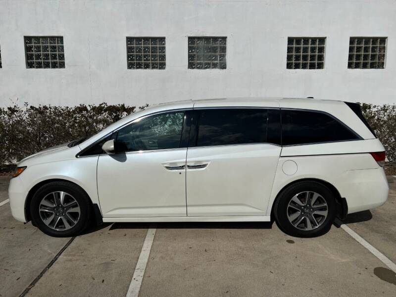 2016 Honda Odyssey for sale at UPTOWN MOTOR CARS in Houston TX