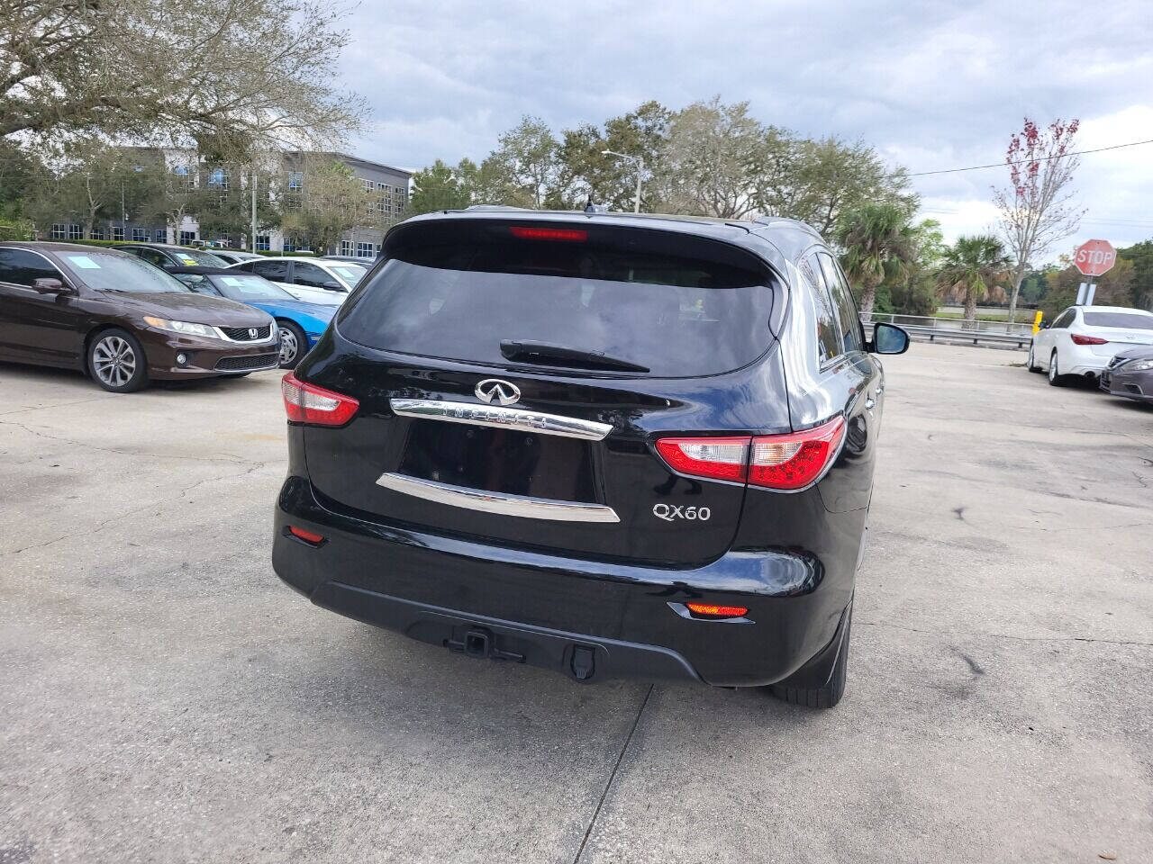 2014 INFINITI QX60 for sale at FAMILY AUTO BROKERS in Longwood, FL