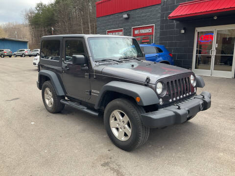 2014 Jeep Wrangler for sale at Tommy's Auto Sales in Inez KY