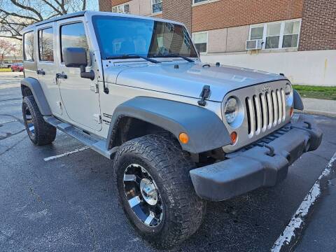 2012 Jeep Wrangler Unlimited for sale at Auto House Superstore in Terre Haute IN
