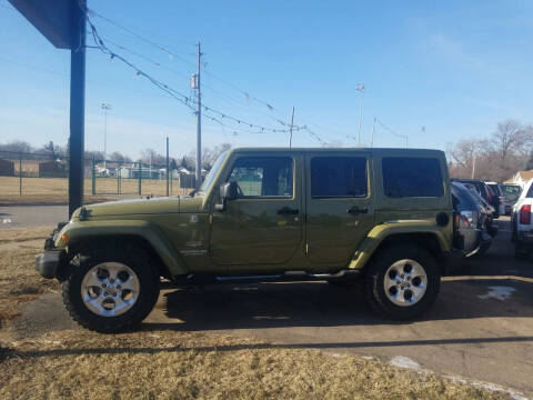 2013 Jeep Wrangler Unlimited for sale at RIVERSIDE AUTO SALES in Sioux City IA