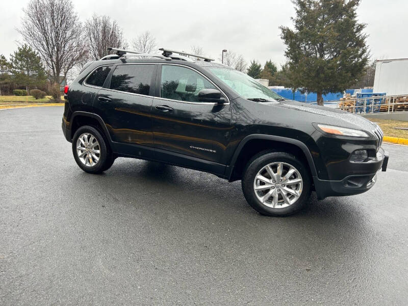 2016 Jeep Cherokee for sale at BOOST MOTORS LLC in Sterling VA