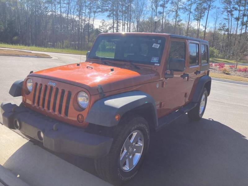 2010 Jeep Wrangler Unlimited for sale at Super Auto Sales in Fuquay Varina NC