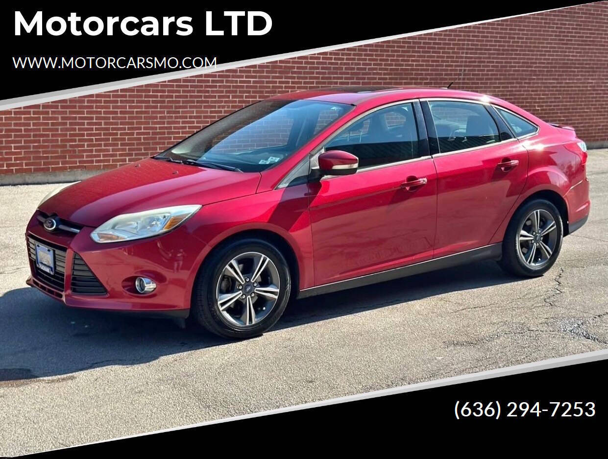 Red 2012 Ford Focus SE SE 4dr Sedan 1