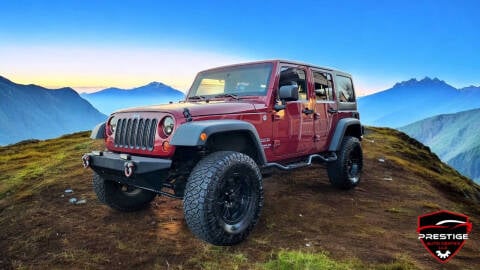 2012 Jeep Wrangler Unlimited for sale at PRESTIGE AUTO CENTER LLC in Salem OR