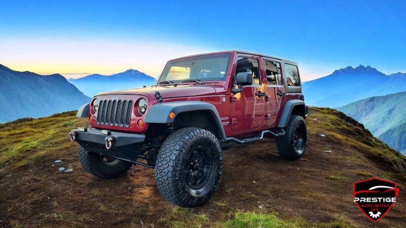 2012 Jeep Wrangler Unlimited for sale at PRESTIGE AUTO CENTER LLC in Salem OR