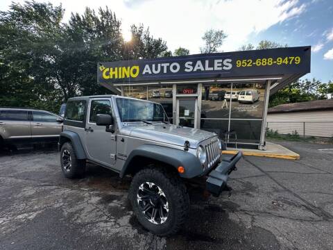 2013 Jeep Wrangler for sale at Chinos Auto Sales in Crystal MN