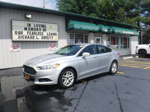 2014 Ford Fusion for sale at GRESTY AUTO SALES in Loves Park IL