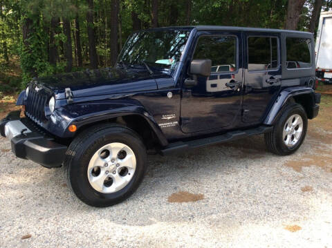2013 Jeep Wrangler Unlimited for sale at ABC Cars LLC in Ashland VA