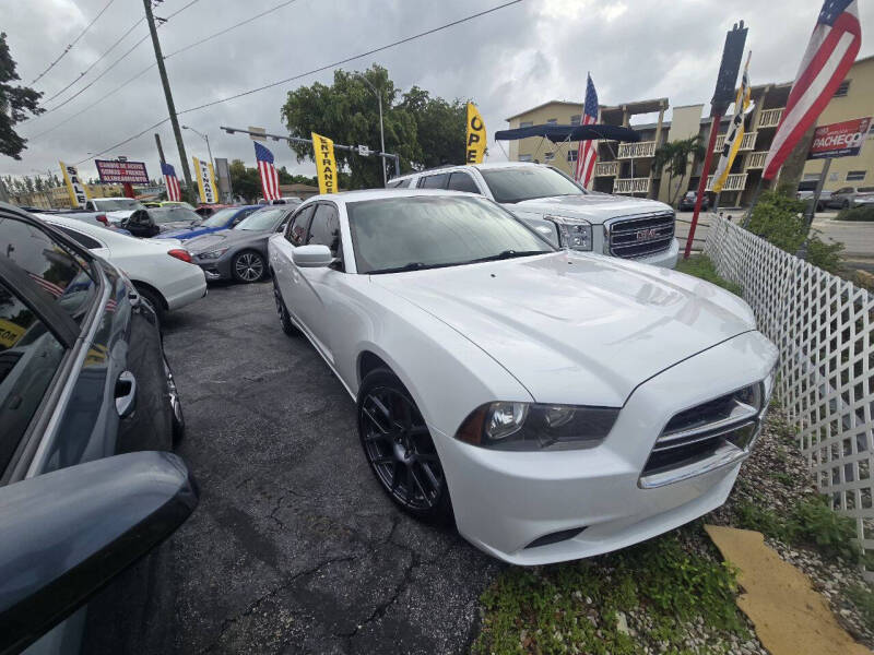 2014 Dodge Charger for sale at Import & Export Auto Sales in Hialeah FL