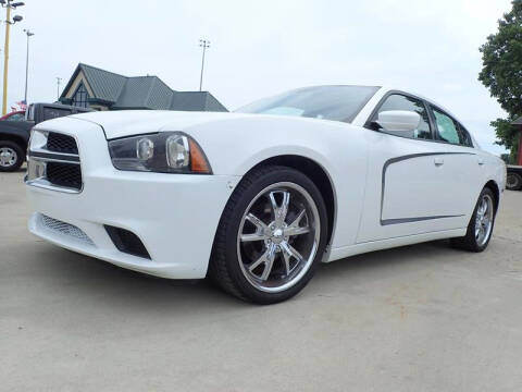 2013 Dodge Charger for sale at RPM AUTO SALES - LANSING SOUTH in Lansing MI