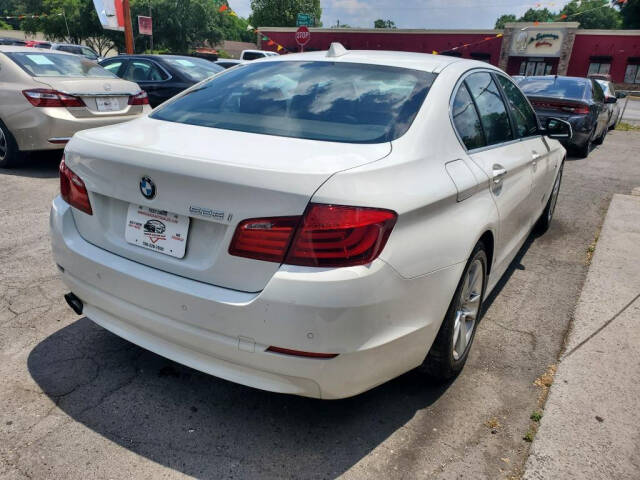 2013 BMW 5 Series for sale at DAGO'S AUTO SALES LLC in Dalton, GA