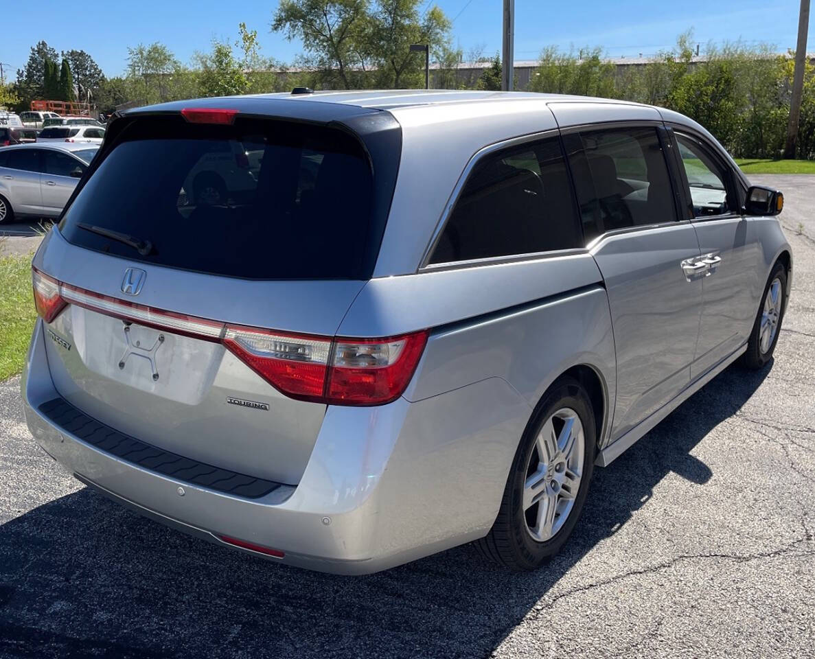 2011 Honda Odyssey for sale at HEARTLAND AUTO SALES in Indianapolis, IN