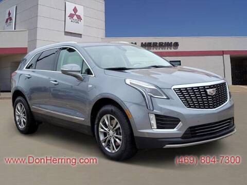 2021 Cadillac XT5 for sale at DON HERRING MITSUBISHI in Irving TX