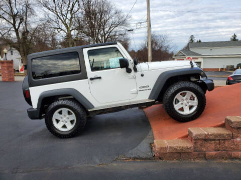 2014 Jeep Wrangler for sale at R C Motors in Lunenburg MA