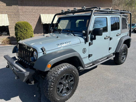 2014 Jeep Wrangler Unlimited for sale at Depot Auto Sales Inc in Palmer MA