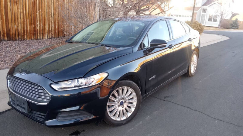2014 Ford Fusion Hybrid for sale at The Car Guy in Glendale CO