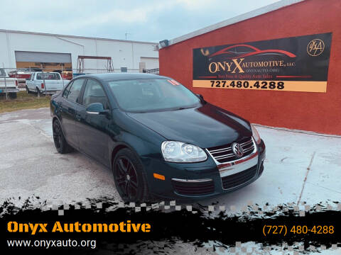 2010 Volkswagen Jetta for sale at ONYX AUTOMOTIVE, LLC in Largo FL