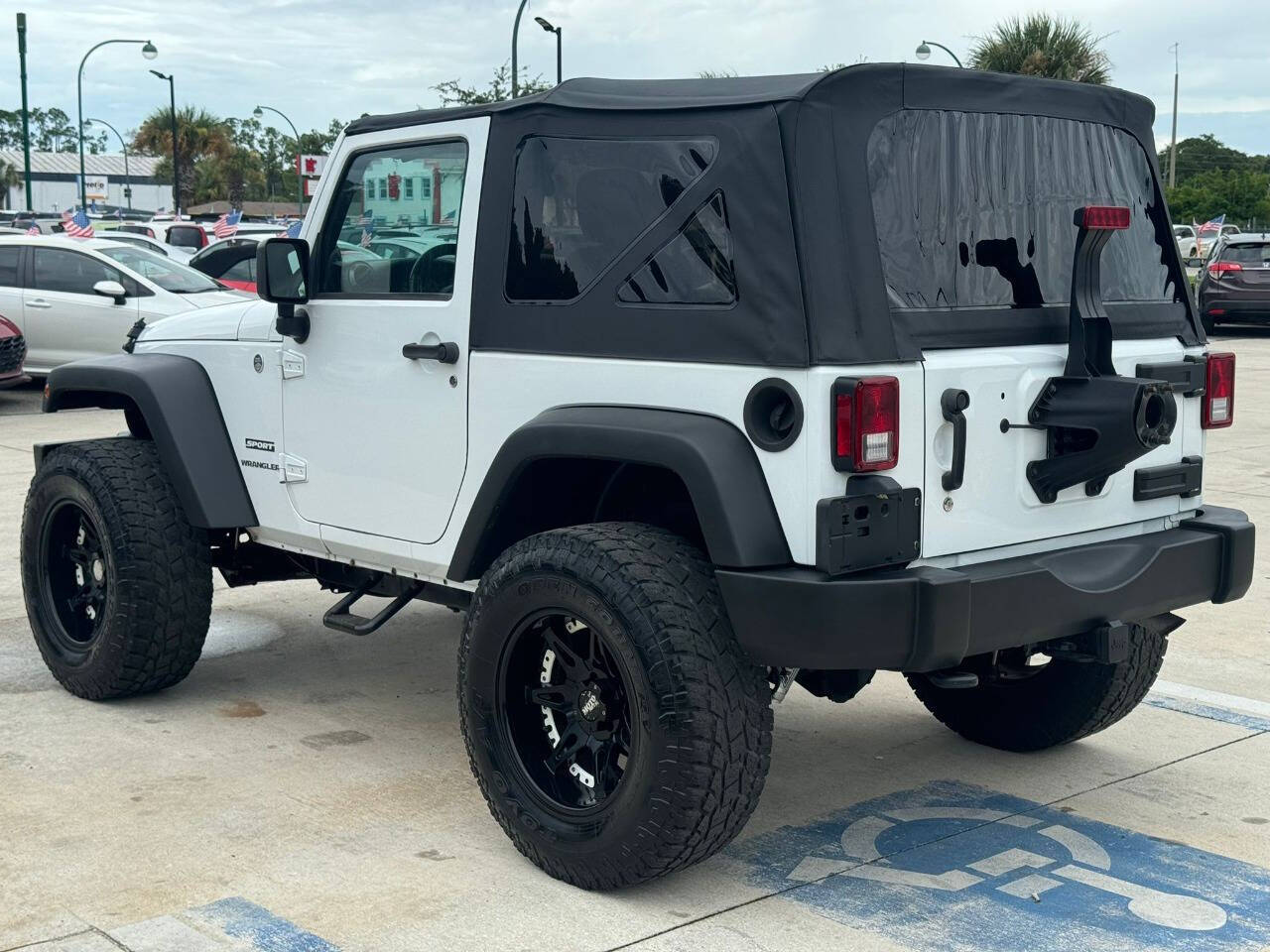 2014 Jeep Wrangler for sale at DJA Autos Center in Orlando, FL