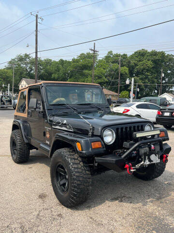 1997 Jeep Wrangler for sale at Gator's Auto Sales in Garland TX