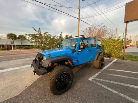 2012 Jeep Wrangler Unlimited for sale at Bay City Autosales in Tampa FL