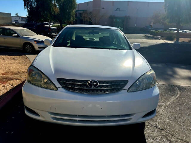 2002 Toyota Camry for sale at HUDSONS AUTOS in Gilbert, AZ