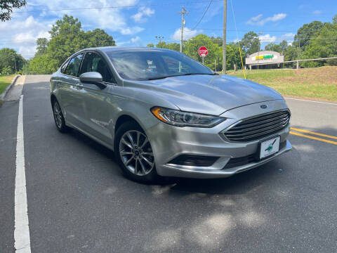 2017 Ford Fusion Hybrid for sale at THE AUTO FINDERS in Durham NC