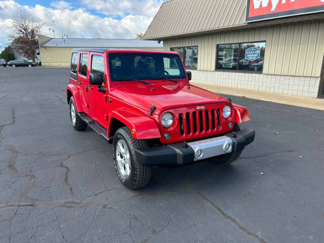 2014 Jeep Wrangler Unlimited for sale at Wyrick Auto Sales & Leasing Inc in Holland, MI