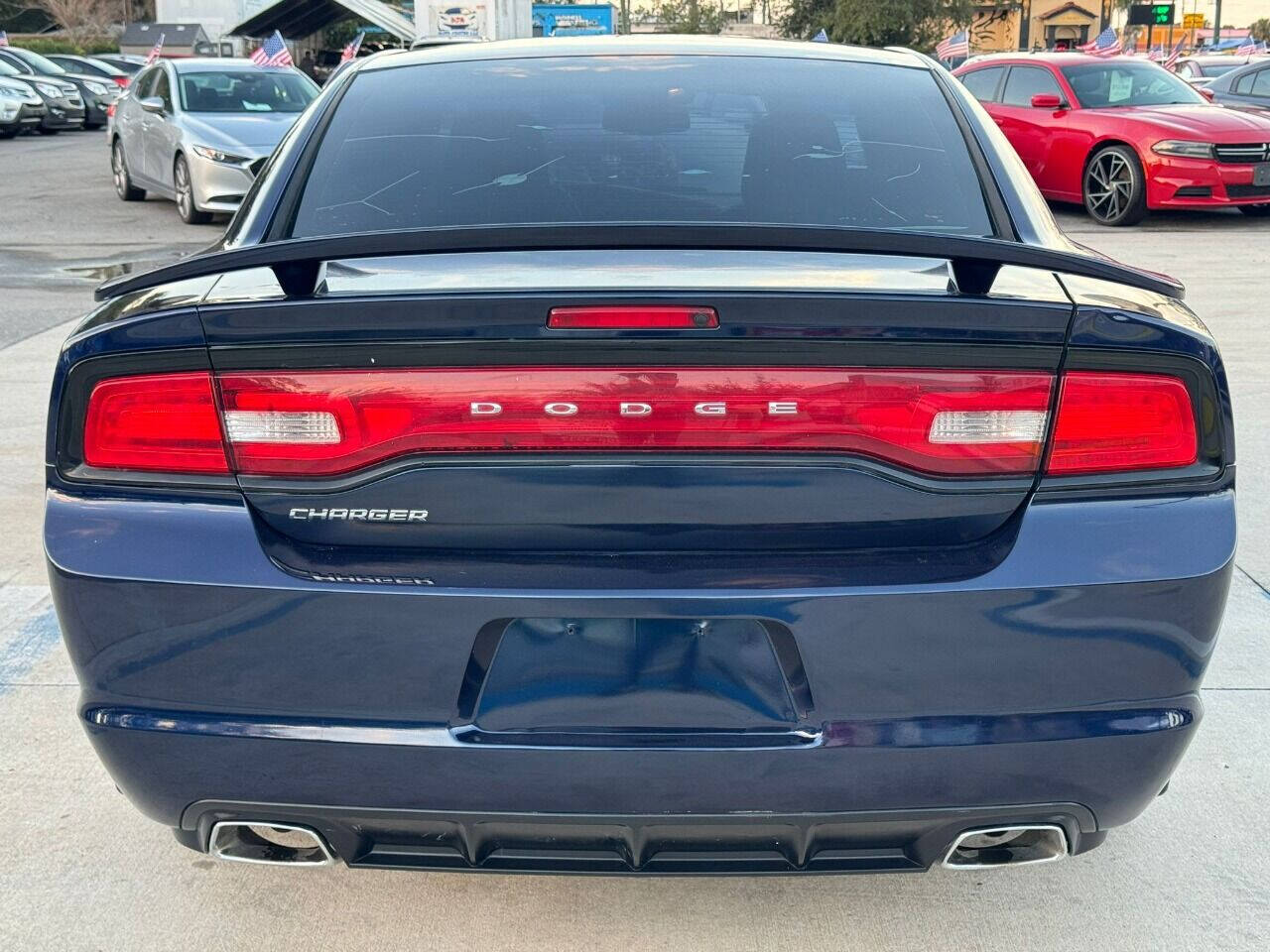 2014 Dodge Charger for sale at DJA Autos Center in Orlando, FL