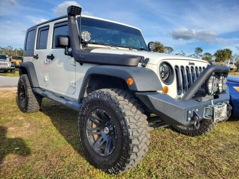 2009 Jeep Wrangler Unlimited for sale at Mox Motors in Port Charlotte FL