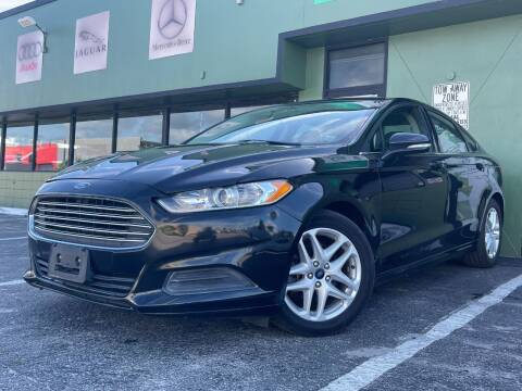 2014 Ford Fusion for sale at KARZILLA MOTORS in Oakland Park FL