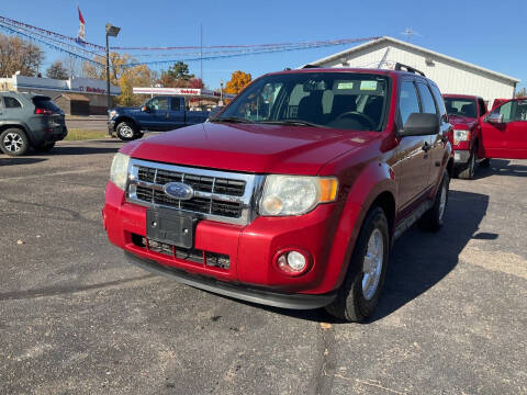 2009 Ford Escape for sale at Steves Auto Sales in Cambridge MN