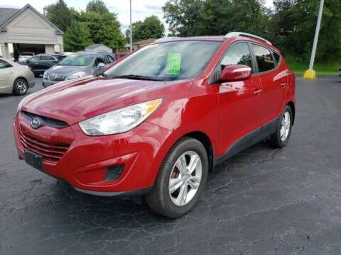 2012 Hyundai Tucson for sale at STRUTHER'S AUTO MALL in Austintown OH