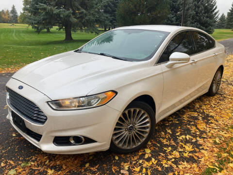 2015 Ford Fusion for sale at BELOW BOOK AUTO SALES in Idaho Falls ID