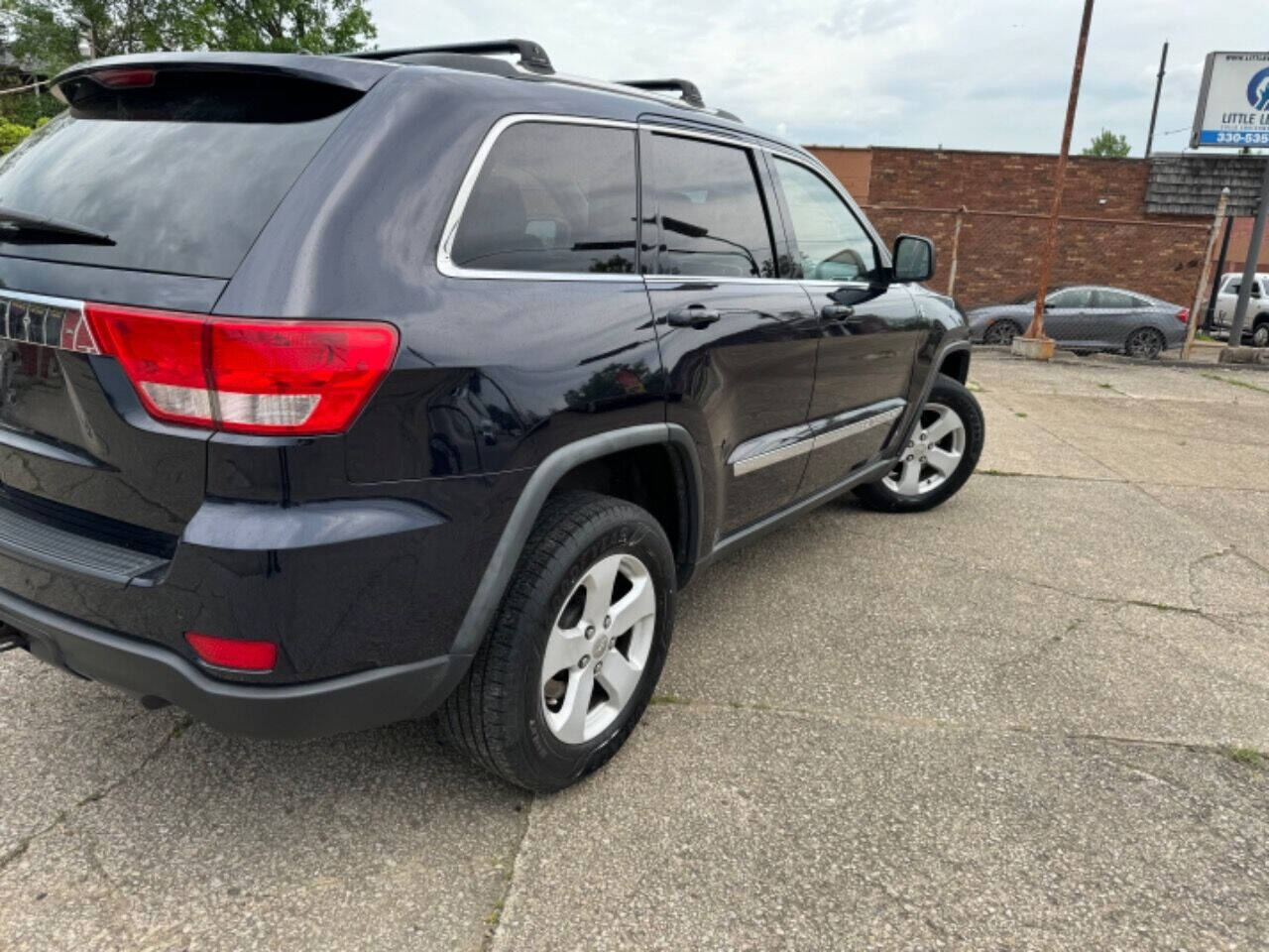 2011 Jeep Grand Cherokee for sale at First Class Auto Mall in Akron, OH