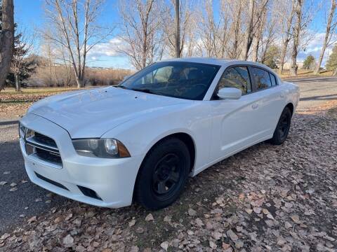 2011 Dodge Charger for sale at BELOW BOOK AUTO SALES in Idaho Falls ID