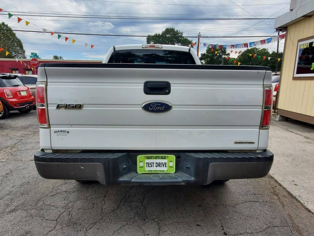 2013 Ford F-150 for sale at DAGO'S AUTO SALES LLC in Dalton, GA