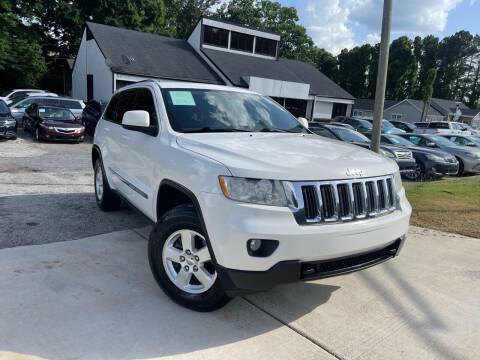 2011 Jeep Grand Cherokee for sale at Alpha Car Land LLC in Snellville GA