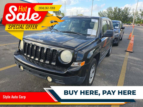 2014 Jeep Patriot for sale at Styln Auto Corp in West Park FL