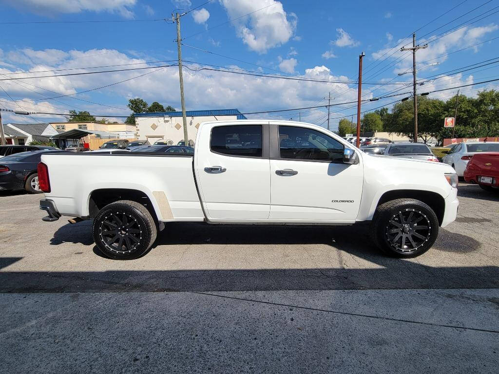 2015 Chevrolet Colorado for sale at DAGO'S AUTO SALES LLC in Dalton, GA