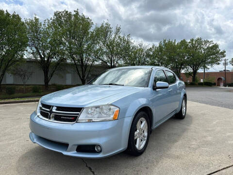 2013 Dodge Avenger for sale at Triple A's Motors in Greensboro NC
