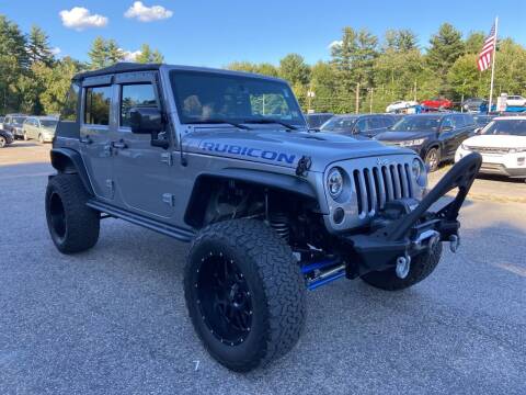 2013 Jeep Wrangler Unlimited for sale at DAHER MOTORS OF KINGSTON in Kingston NH