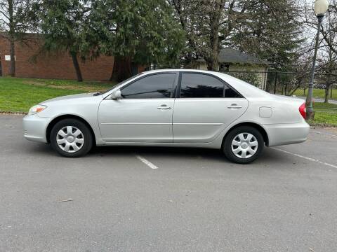 2004 Toyota Camry for sale at TONY'S AUTO WORLD in Portland OR