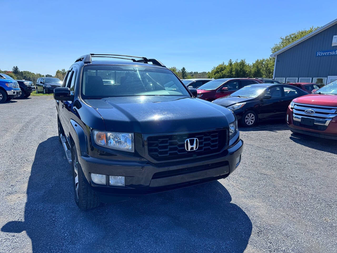 2014 Honda Ridgeline for sale at Riverside Motors in Glenfield, NY