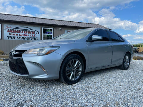 2016 Toyota Camry for sale at Jim's Hometown Auto Sales LLC in Cambridge OH