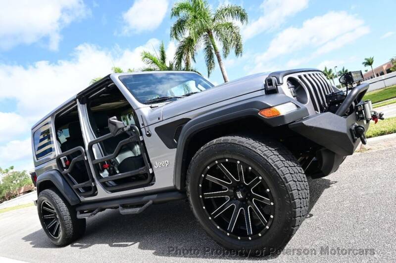 2018 Jeep Wrangler Unlimited for sale at MOTORCARS in West Palm Beach FL