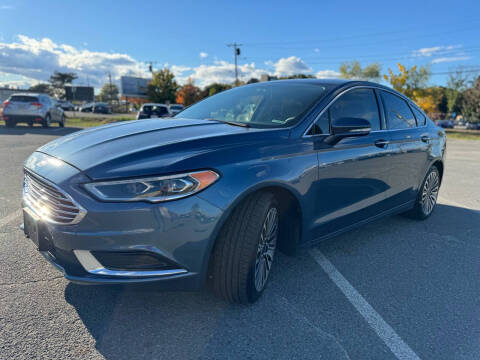 2018 Ford Fusion for sale at MGM Auto Group in Framingham MA